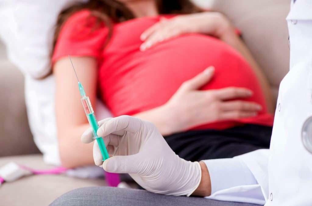 W jakich miesiącach ciąży należy podać szczepionkę przeciw grypie?