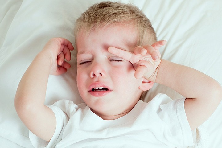 Jak rozumieć bóle głowy u niemowląt?