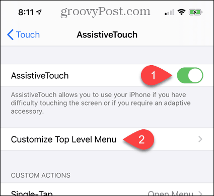 Włącz AssistiveTouch w ustawieniach iPhone'a