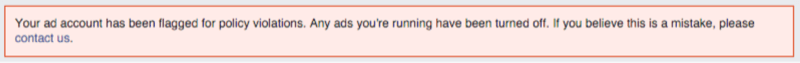 Komunikat ekranowy reklam na Facebooku: Twoje konto zostało oflagowane z powodu naruszenia zasad